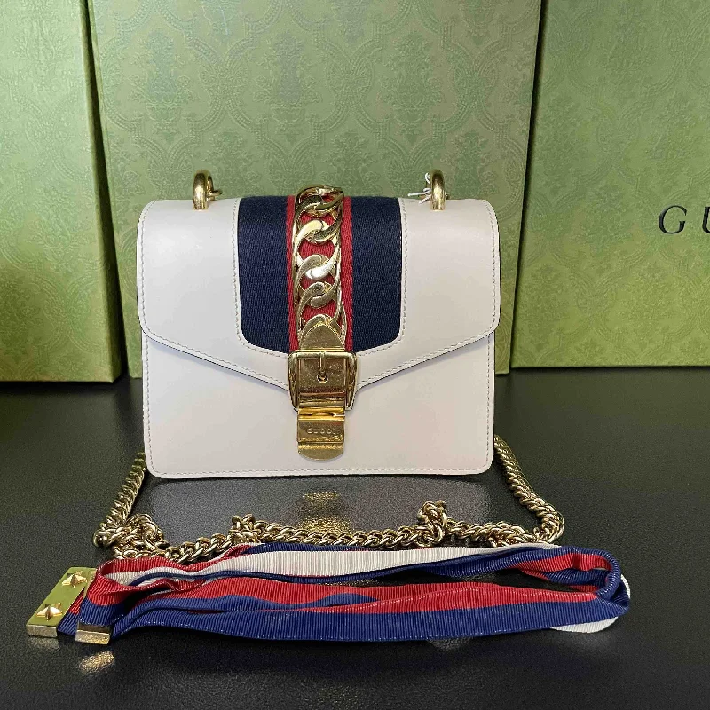 Women Gucci bags with a magnetic snap closure for easy accessGucci Sylvie White Leather Gold Chain Shoulder Bag Small