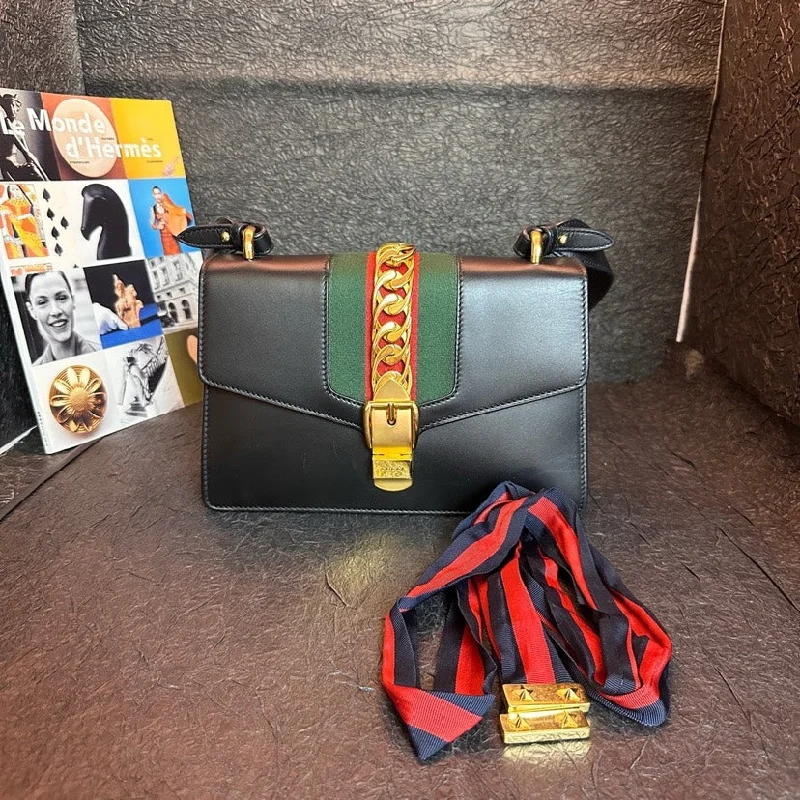 Women Gucci bags with a chain - link trim and a leather bodyGucci Sylvie Gold Buckle Striped Grosgrain Bag Black 25.5cm