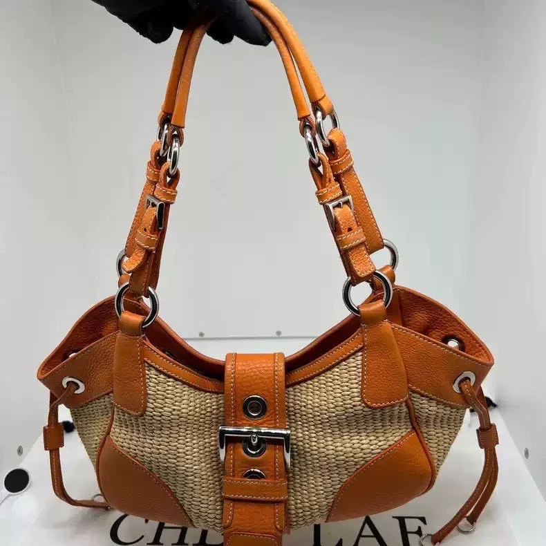 Ladies Prada shoulder bags with a wide - width strap for enhanced comfortPrada Woven Straw Moon Bag Orange Belt Buckle Shoulder Bag