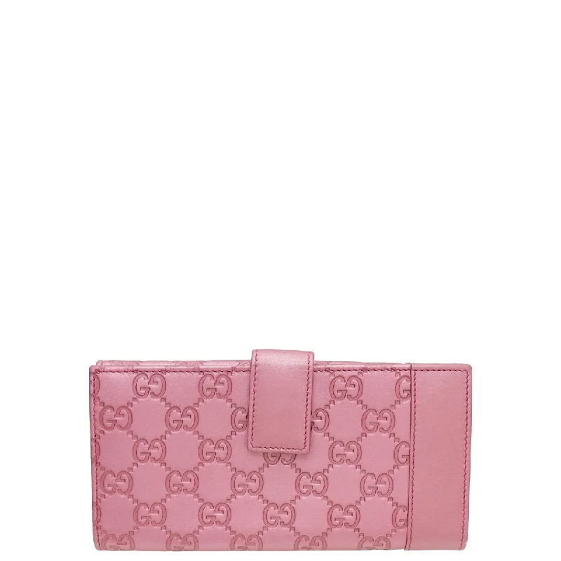 Women Gucci bags with a front - flap pocket for quick - access itemsGucci Metallic Pink Guccissima Heart Charm Continental Wallet