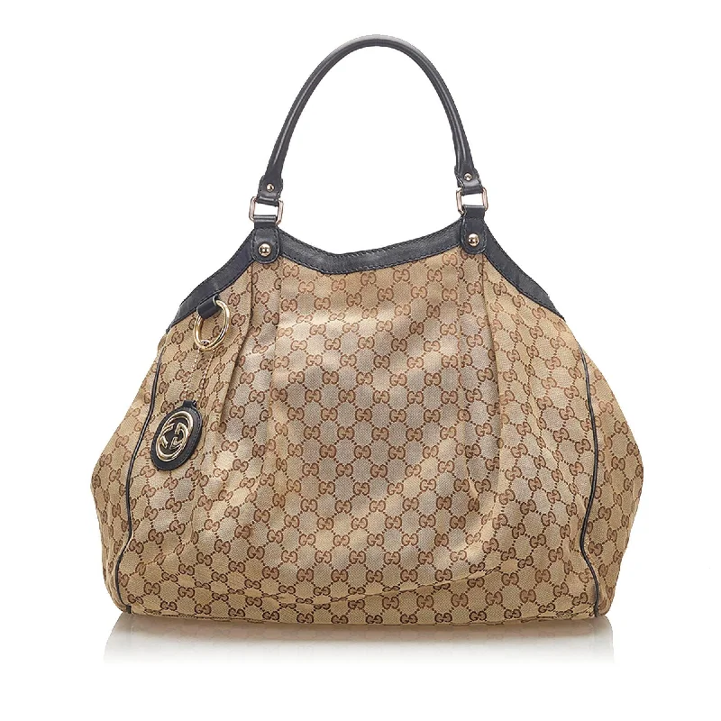 Women Gucci bags with a zippered interior pocketGucci GG Canvas Sukey Tote (SHG-18049)