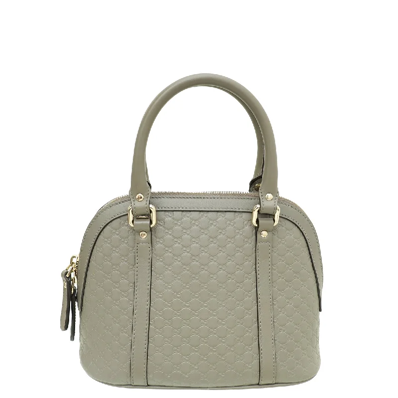 Women Gucci Sylvie bags with a monogram - embossed leatherGucci Gary Microguccissima Dome Satchel Mini Bag