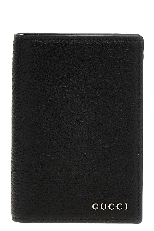 Women Gucci bags with interlocking G hardware for a classic lookGucci Men Logo Passport Holder