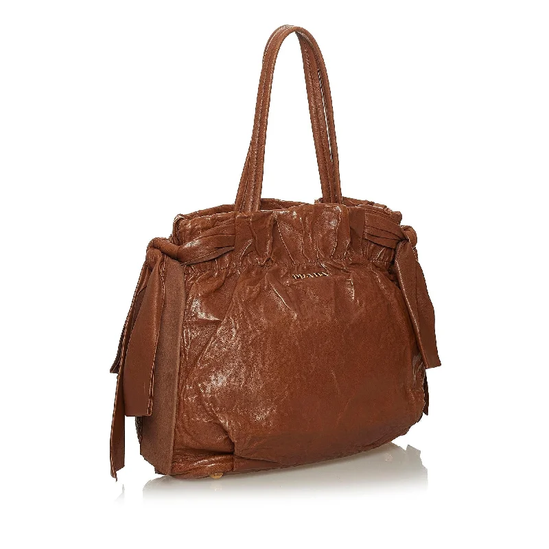 Prada handbags with a patent - leather finish for a shiny and sophisticated appearancePrada Bow Nappa Leather Satchel 28742