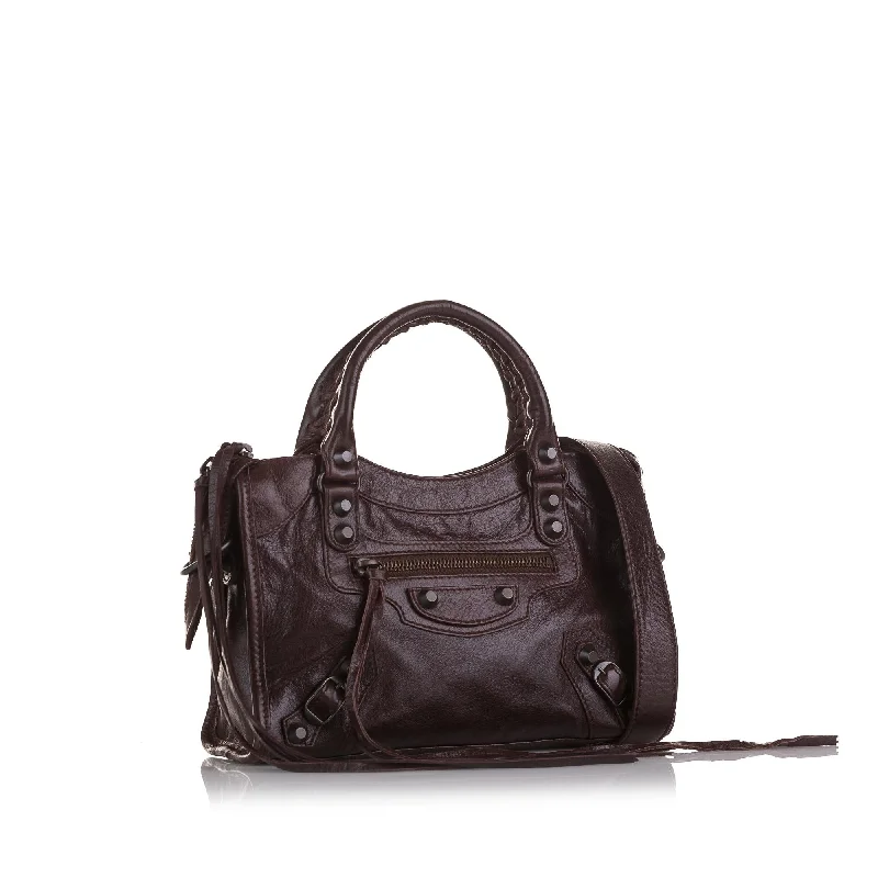 Balenciaga Le Cagole large size with tassel - trimmed cornersBalenciaga Mini Motocross Classic City (SHG-PLvYDl)