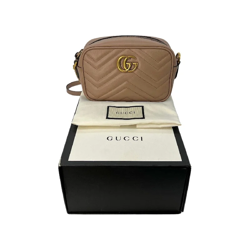 Women Gucci bags with a magnetic snap closure for easy accessGucci Marmont Matelassé Mini Shoulder Bag