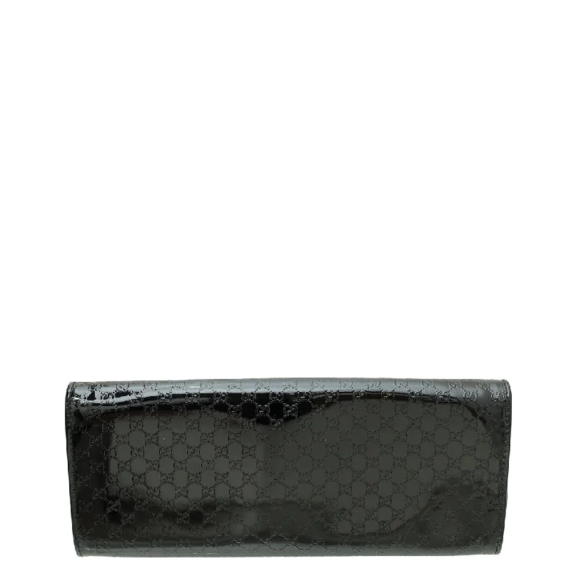 Ladies Gucci handbags with a detachable coin purse insideGucci Black GG Microguccissima Broadway Clutch