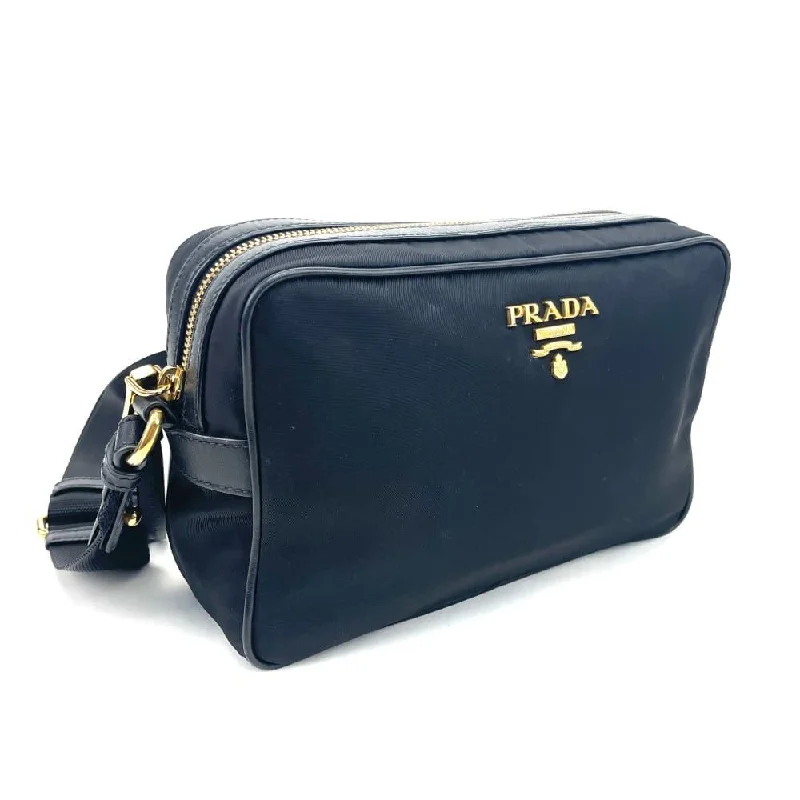 Prada nylon backpacks with a sleek, minimalist appearancePRADA Soft Calf-Trimmed Tessuto Camera Bag