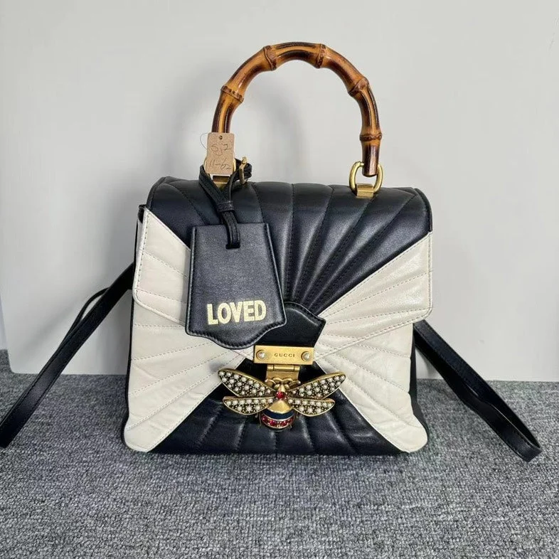 Ladies Gucci Dionysus bags with a star - shaped charmGucci Sylvie Black White Leather Bamboo Handle Shoulder Bag