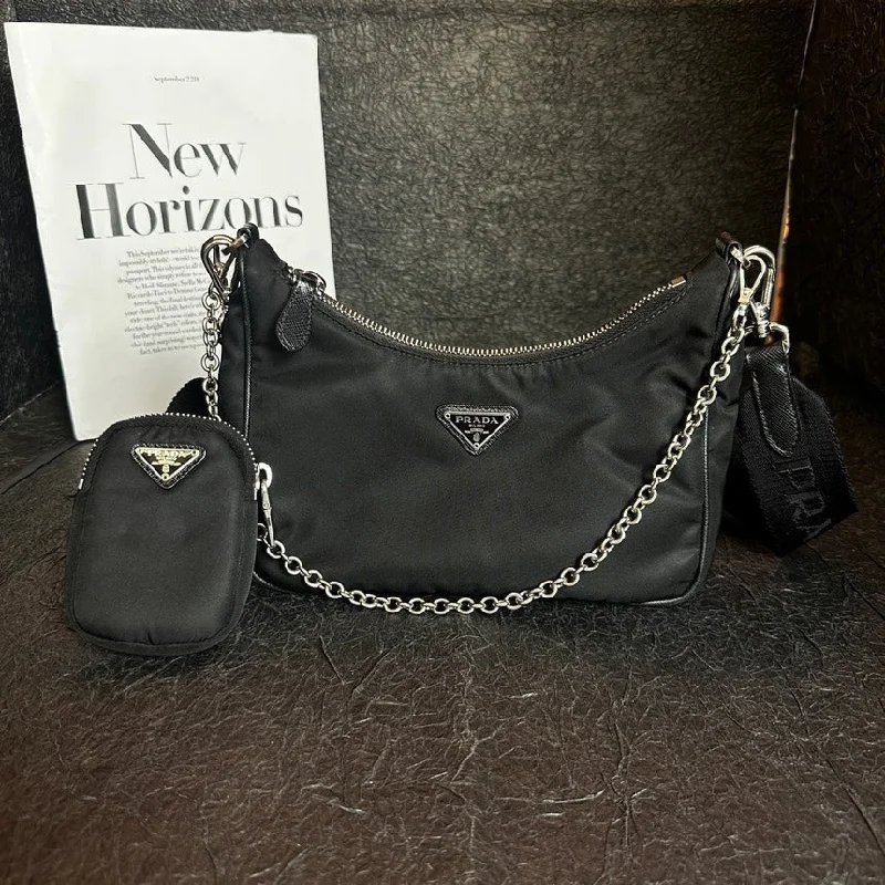 Ladies Prada shoulder bags with a magnetic - closure flap for easy opening and closingPrada Re-Edition 2005 Black Nylon Three-In-One Bag 21cm