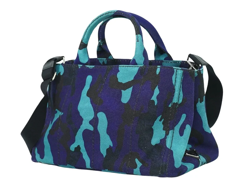 Prada tote bags with a printed Prada logo on the front for brand visibilityPRADA Canapa Handbag