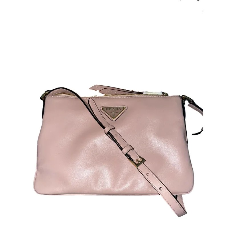 Prada bags with a front - zip pocket for small items like cards and keysPrada Shiny Light Calf Rosa Pink Cross Body Bag 1BH173