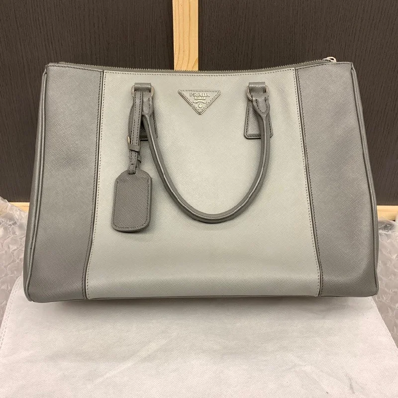 Ladies Prada handbags with a detachable wallet inside for added conveniencePrada Grey Leather Tote Bag Large