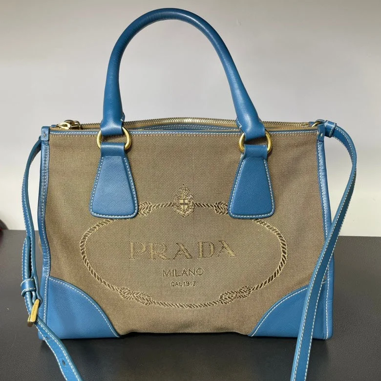 Prada nylon backpacks with a padded back panel for comfort during long - term usePrada Canapa Blue Beige Canvas Leather Logo Tote Bag Medium