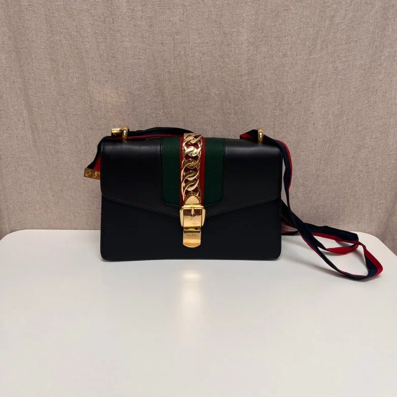 Gucci handbags for women with a metal - framed claspGucci Sylvie Black Leather Top Handle Bag Medium Size