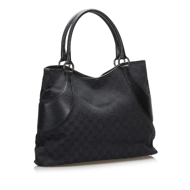 Women Gucci bags with a chain - link trim and a leather bodyGucci GG Canvas Tote (SHG-36815)