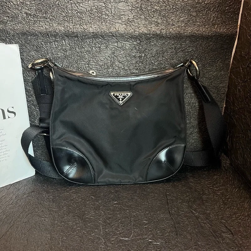 Prada bags with a zip - top closure and multiple interior pockets for organizationPrada Black Nylon Parachute Crossbody Bag 27cm