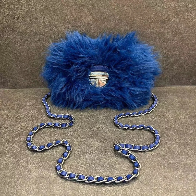 Prada Cleo bags with a crystal - embellished logo for added luxuryPrada Blue Shearling Chain Shoulder Bag Small