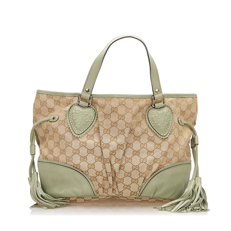 Women Gucci bags with a front - zip pocket for small itemsGucci GG Canvas Tote Bag (SHG-18536)