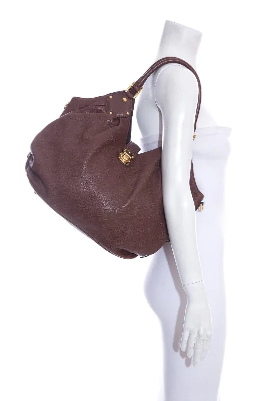 Louis Vuitton Twist bags with a crystal - embellished LV - turnlockLouis Vuitton Brown Leather Monogram Mahina Hobo Handbag