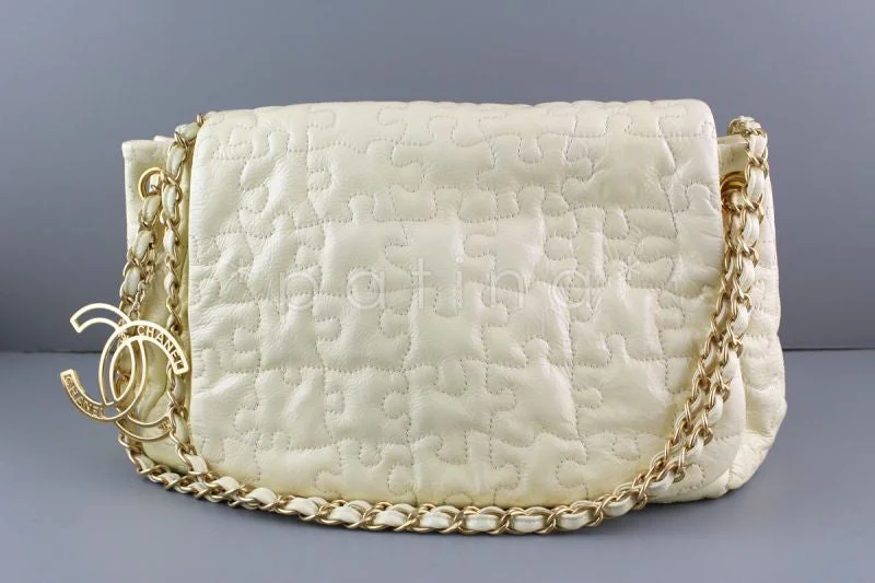 Chanel All - Match Handbag for Versatile StylingChanel Ivory Jumbo Patent Puzzle Flap CC Charm Bag