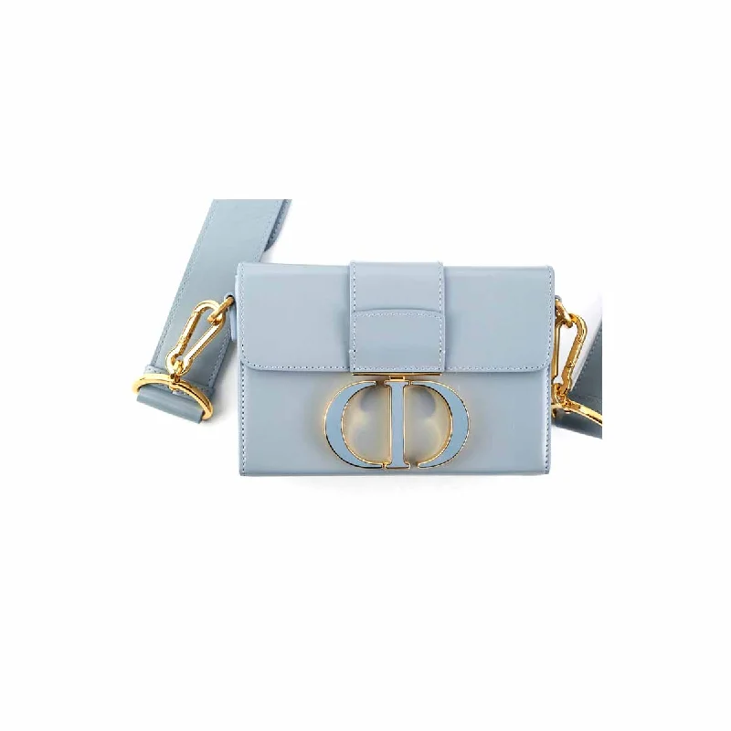 Christian Dior handbags with a snap - button closure and a decorative buckleDior 30 Montaigne Bag Blue-Gray