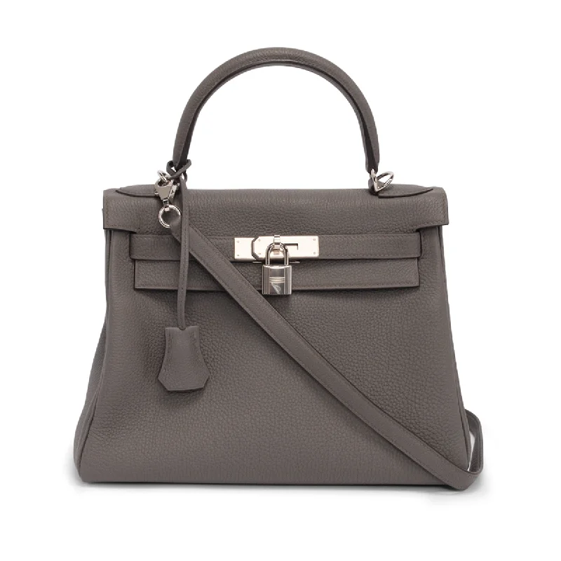 Hermès Kelly Bags in a deep indigo blue for a classic and sophisticated lookHermes Gris Etain Togo Kelly 28