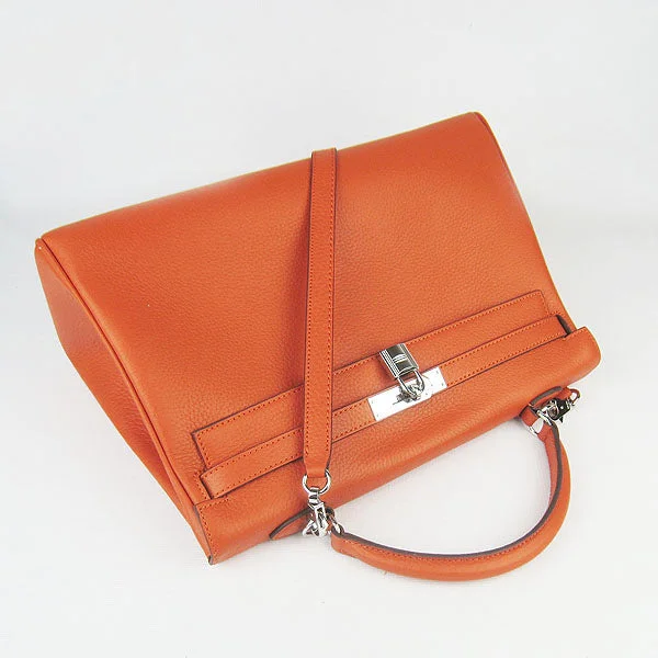 Hermès Kelly Bags in a rare shade of royal purple for a statementHermes Kelly 35cm Togo Leather Handbag Orange/Silver