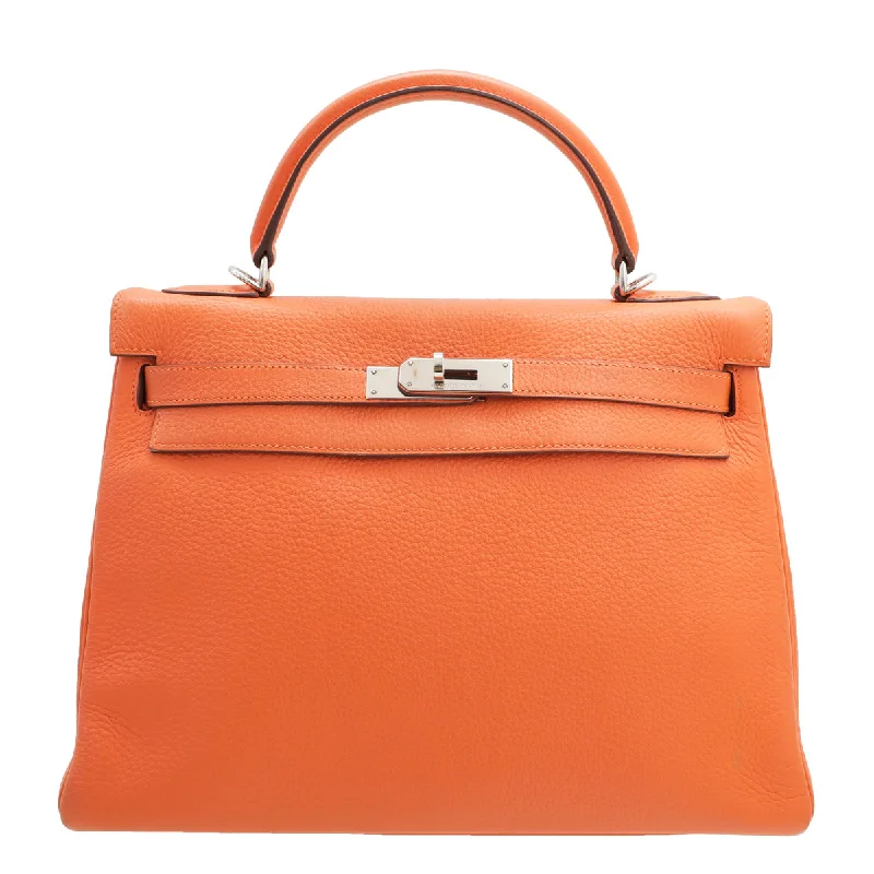 Hermès Kelly Bags with a monogram - embossed leather panelHermes Orange Kelly 32 Bag