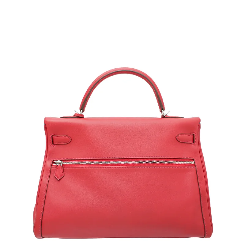 Hermès Kelly Bags with a monogram - embossed leather panelHermes Rouge Lakis Kelly 35 Bag