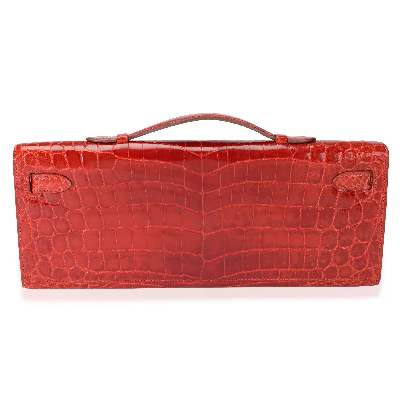 Hermès Kelly Bags in a bold orange for a standout appearanceHERMES Sanguine Shiny Niloticus Crocodile Kelly Cut GHW