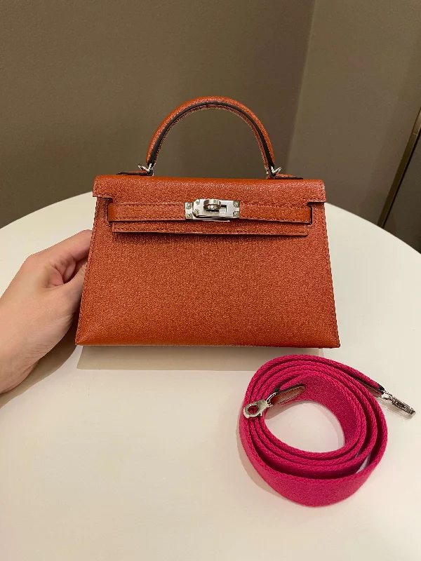 Hermès Kelly Bags in a light sky blue for a refreshing lookHermes Mini Kelly 20 Cuivre Chèvre / Rose Mexico